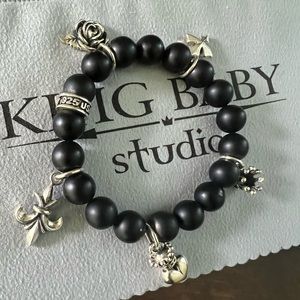 King baby Onyx bead bracelet with 5 motif charms